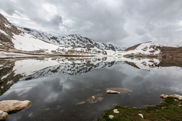 A lake and the reflection of a mountain in the water on the High Taşeli Plateau east of Antalya...