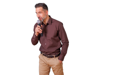Mature man speaker holding microphone, giving a presentation or performing stand-up comedy, speaking to an audience