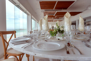 elegant banquet tables prepared for a conference or a party indoors