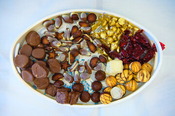 Assorted Chocolate Cookies and Sweets on White Table