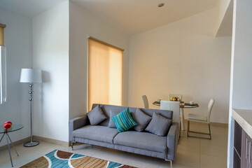 Modern Living Room with Retro Colorful Chair and Natural Light