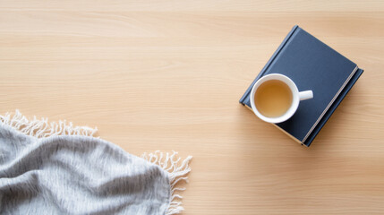 Cozy home scene with teacup and book on kotatsu table