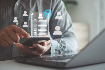 HR, Human resources management concept. Digital human resource interface with hr checklist document, employee profile icon on smartphone screen for recruitment management, staff data tracking system.