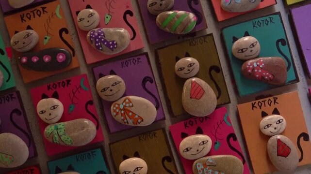 Handcrafted cat souvenirs from Kotor, Montenegro, pivoting clip