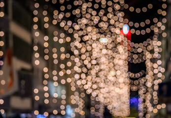 Twinkling festive lights on Rennweg street in Zurich, Chrsitmas markets, bokeh