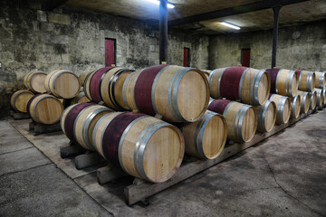 Wine industry storage and production facility with wine barrels