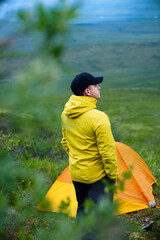 Man enjoys hiking adventure trip in Denali national Park