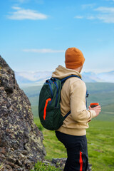 Man enjoys hiking adventure trip in Denali national Park