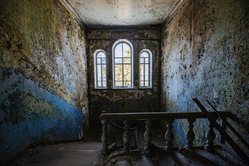 Old abandoned building. Walls with peeled paint