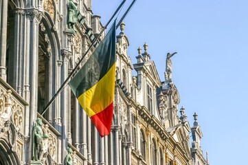 Belgian flag at the Maison du Roi in the Grand Place, Brussels Belgium