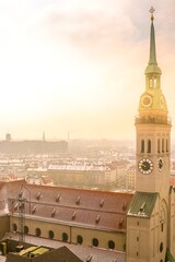 View of the St Peters Church and the city of Munich during a sunset, Germany