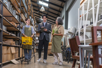 Fototapeta premium Asian Male Investor Touring Family-Run Ceramic Warehouse for Partnership Deal