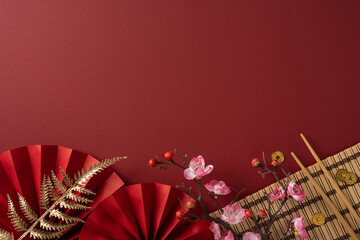 Festive Chinese New Year scene with red fans, blossoms, and traditional decor, conveying...
