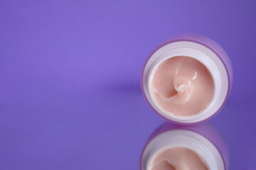 Pink cosmetic jar, face cream, skin care product, beauty product