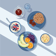 Overhead View of a Healthy Breakfast Spread with Fruits and Grains.