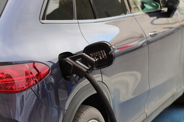 Electric car charge station, eco friendly recharge on parking