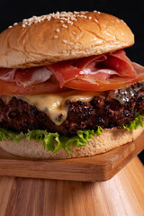 Tempting Fast Food Icon: Juicy Beef Patty and Melted Cheddar in a Restaurant Setting