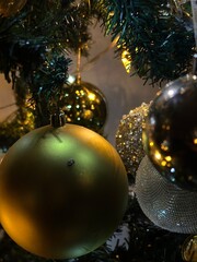 Christmas tree decorated with a variety of ornaments.