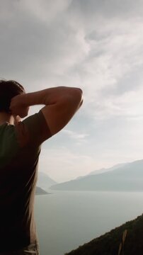 mindful morning stretch in mountains slow motion orbit shot spiritual connection nature