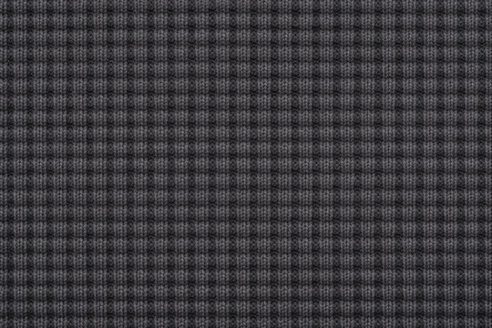 Charcoal waffle knit wool texture background with seamless thermal pattern