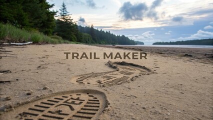 Footprints on a sandy beach marking a clear trail