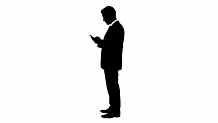 Silhouette of a businessman using a mobile phone.