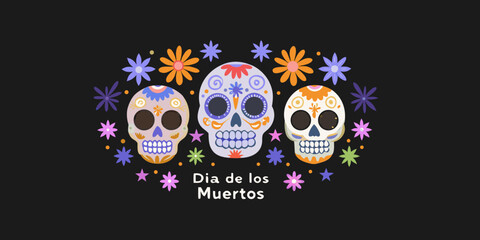 Colorful sugar skulls and floral designs celebrate the day of the dead