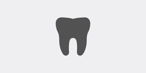 Simple illustration of a single dark molar tooth against a light background