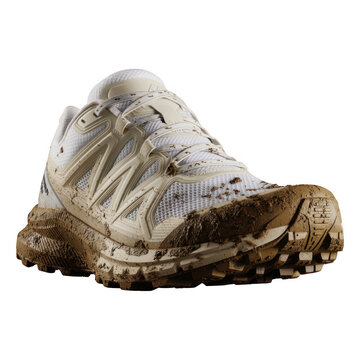 Muddy white running shoe isolated on a transparent background dirty