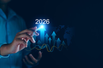 Business goals beginning 2026 new year concept, Businessman touching increase arrow investment graph future growth 2026. Financial planning target and strategy, Budgeting Plan and business challenge.