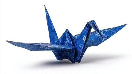 Folded origami crane isolated on white background