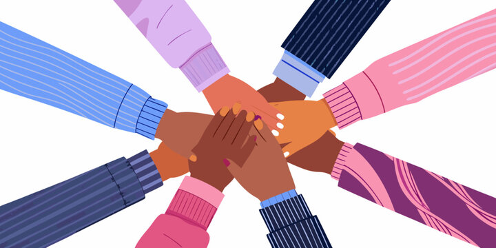 Diverse hands joined together in a circle symbolizing unity and collaboration
