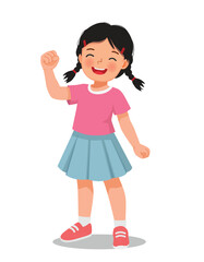 Little girl showing win fist up expression gesture feeling proud with victory