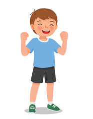 Little boy showing win fist up expression gesture feeling proud with victory
