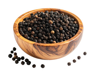 Whole peppercorns fill a wooden bowl, scattered on a black surface