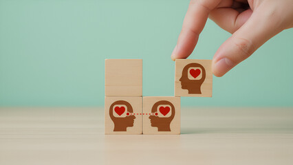 Healthcare/Wellness-Inspired Growth Icons: Stacked Blocks with Heart Symbols and Hand Placement