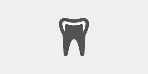 A simple black silhouette of a human tooth on a light gray background