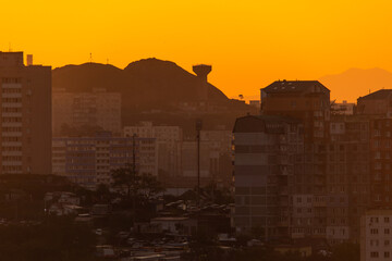 Urban development of Vladivostok at dawn. Bright dawn in Vladivostok.