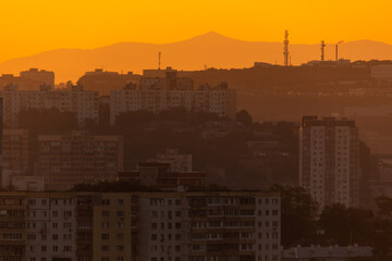 Urban development of Vladivostok at dawn. Bright dawn in Vladivostok.