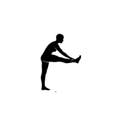 Silhouette of a person doing a hamstring stretch