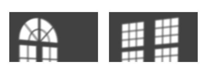 Shadow patterns of arched window and grid