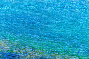 Tropical rocky beach rocks waves and water Ilha Grande Brazil.