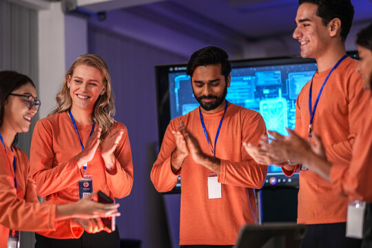 A young innovator in the near future, her smart glasses displaying an augmented reality presentation, smiles as she witnesses a breakthrough in immersive collaborative technology. - Powered by Adobe
