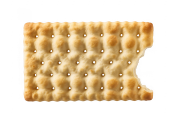 Bite taken out of a saltine cracker biscuit snack isolated on a transparent background