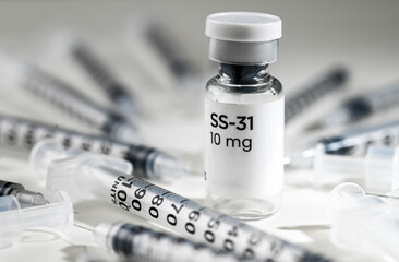 Close up of SS-31 Elamipretide Vial with Single Use Syringes Gauge 31 Around