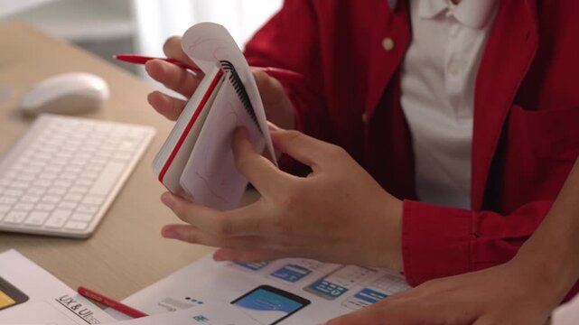 Panorama video of startup company employee planning on user interface prototype for mobile application or website in office. UX UI designer brainstorm designing user friendly interface plan. Synergic