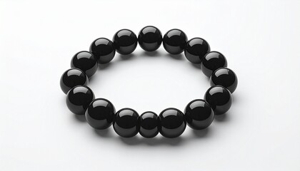 Obraz premium Black bead bracelet on white minimal background