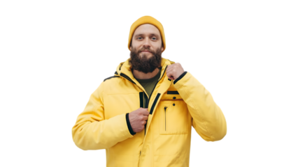 Man wearing a yellow jacket and hat adjusting the zipper outdoors isolated on transparent background