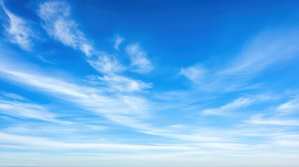 Serene ocean beach view under expansive blue sky and clouds peaceful coastline boasts blue sky with scattered white clouds
