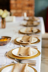 Beautiful table set for dinner with flowers